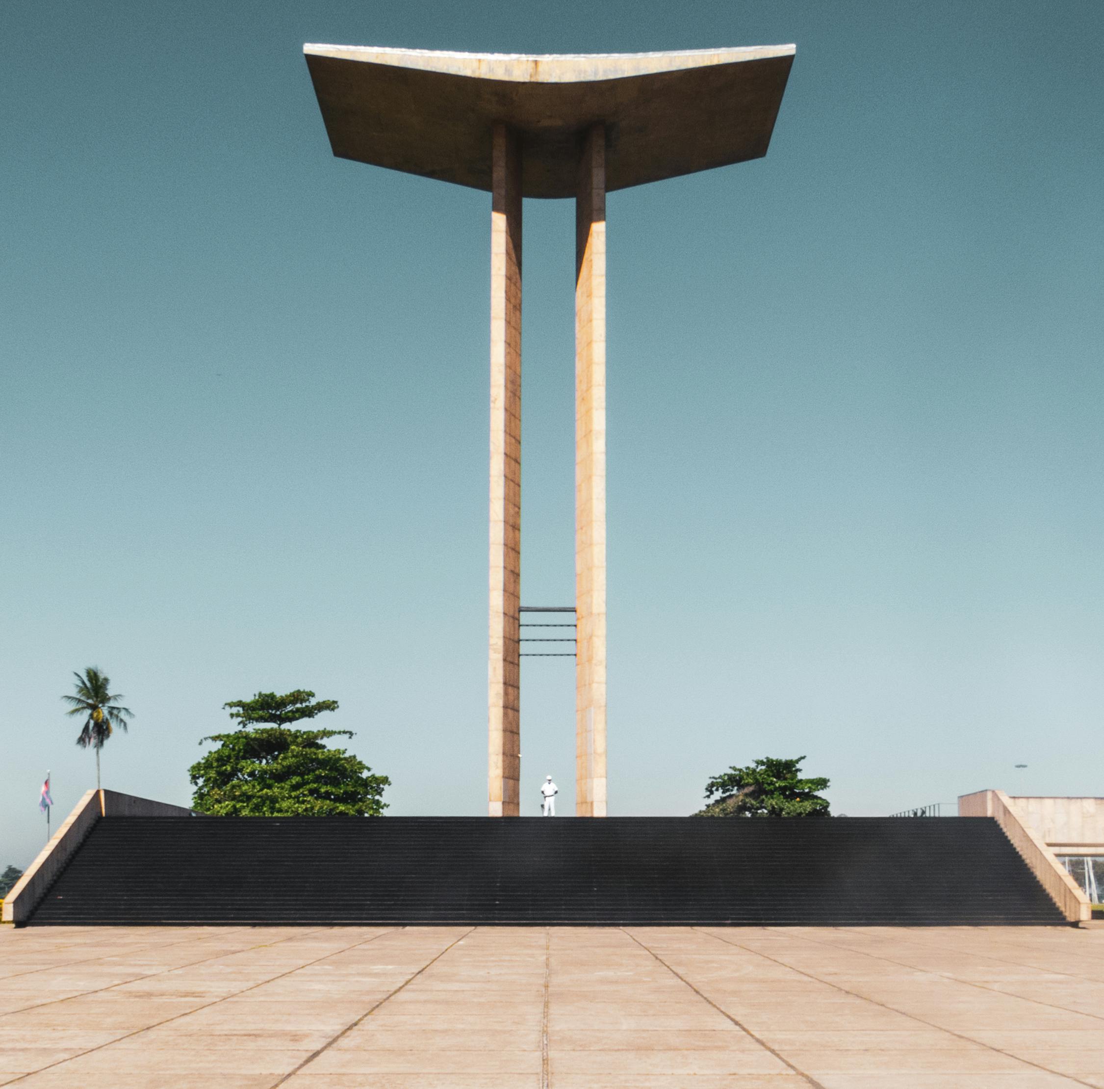 Futuristic monument in sunny urban square, Rio de Janeiro, Brazil.